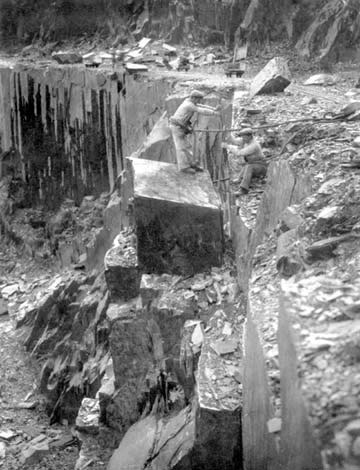 Photograph: Rockmen at Work in Douglas Gallery, Penrhyn Quarry, Bethesda