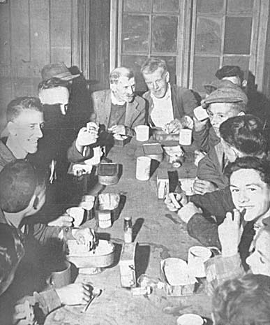 Photograph: Workers in the `Caban' [Cabin] at Oakeley quarry, Blaenau Ffestiniog.