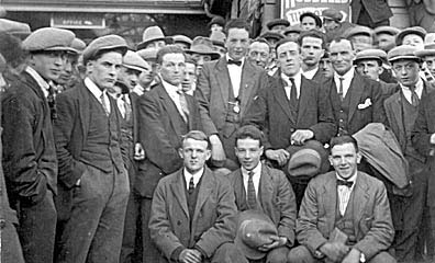 Photograph: `In London Station - the workers beginning their journey to Australia to work in the quarries.' [Geraint Vaughan Jones].