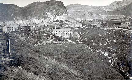 Photograph: Cwm Bowydd, the town of Blaenau Ffestiniog, the writing slate mill and the Lord, Maenofferen and Diffwys quarries. [Geraint Vaughan Jones].