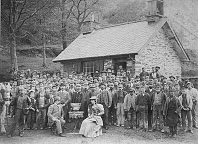 Photograph: Quarrymen from the Corris area on the occasion of the presentation of a bowl to the works manager.