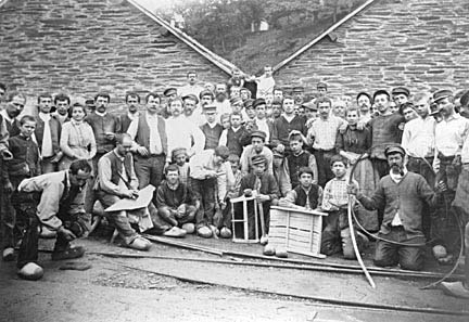 Photograph: Group of quarrymen and women, Ste Anne Quarry, Fumay, France.