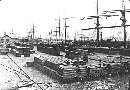 Photograph: Slates at [Porthmadog] quay awaiting loading.