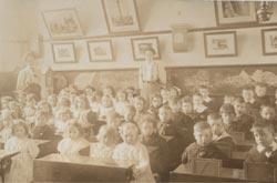 Bontnewydd Council Schools, where writing slates are stored vertically on the desks in front of the pupils.