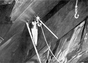 An Undergroung Chamber at the Park Slate Mine showing drilling in overhead rock by a Kellow Rock Drill.